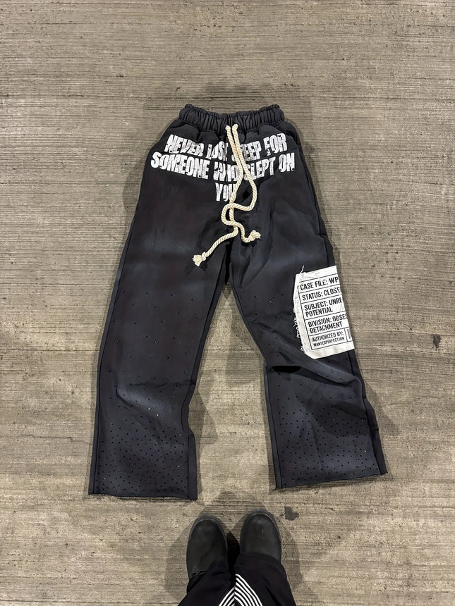 Pantalones de chándal unisex estilo retro americano urbano, corte holgado, estampado de grafiti, pantalones de jogging, ropa casual estilo hip hop Harajuku de calle.