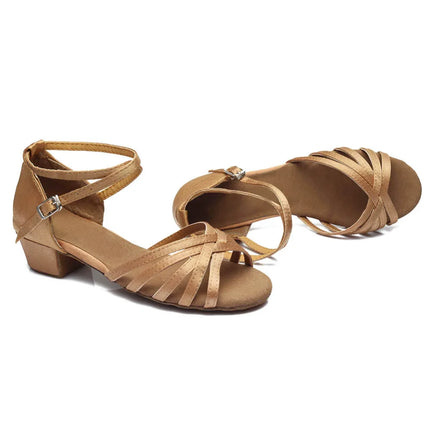Pair of tan satin ballroom dance shoes showing front and side views