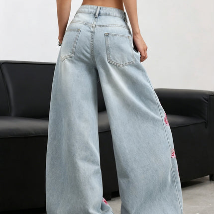 American high waisted wide leg jeans light blue washed pink floral embroidery with loose hanging edges