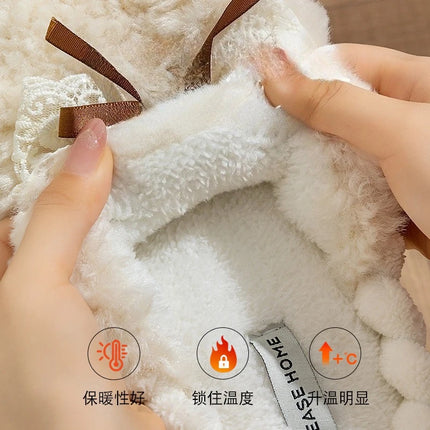 Close-up of the cream plush lining inside a bow slipper