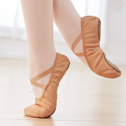 Tan canvas ballet slippers worn during dance practice