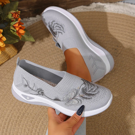 Gray floral knit slip-on sneakers with white soles