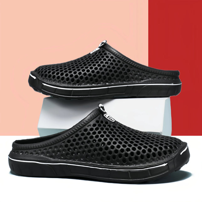 Black perforated slip-on clogs