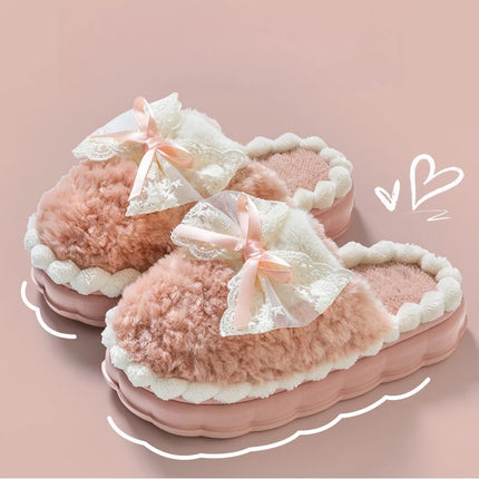 Pink plush house slippers with lace bows