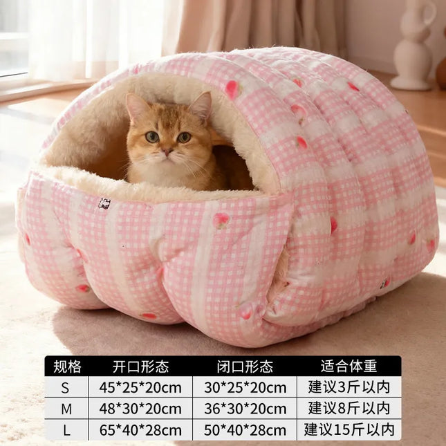 Pink plaid cat bed with a cat inside and an S/M/L size chart