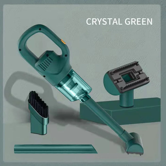 Green handheld vacuum cleaner with nozzle accessories, labeled Crystal Green