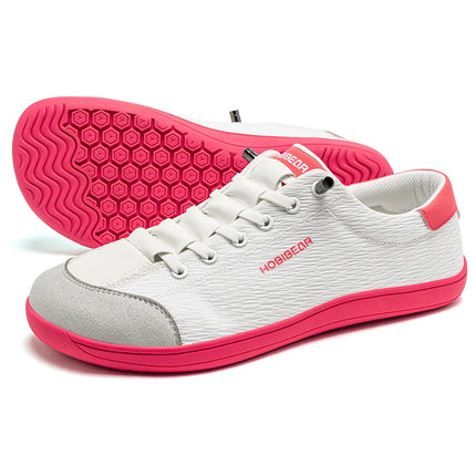 White HOBIBEAR sneakers with bright pink patterned soles
