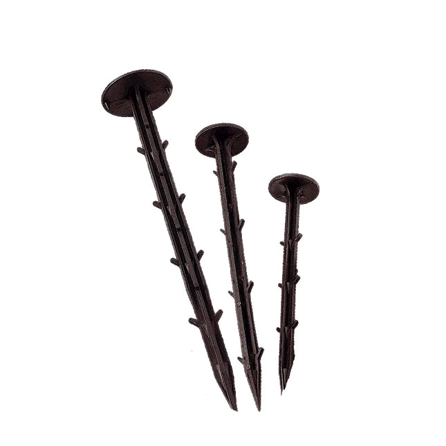 Three black ground stakes of varying lengths on a white background