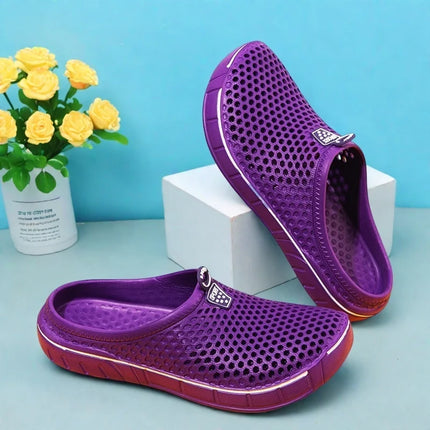 Purple perforated EVA clogs displayed from the top and side
