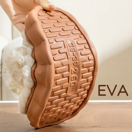 Hand bending a bow slipper to show its patterned EVA outsole