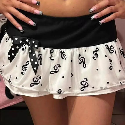 Y2K Music Note Print Mini Skirt, Black White Ruffle Micro Skirt with Polka Dot Bow,Kawaii Aesthetic Low Waist Skirt for Women
