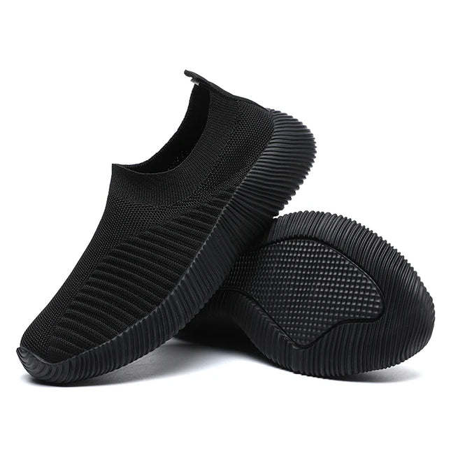 Black slip-on knit sneaker with black sole