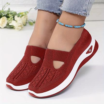 Red knit slip-on sneakers with instep cutouts and white soles