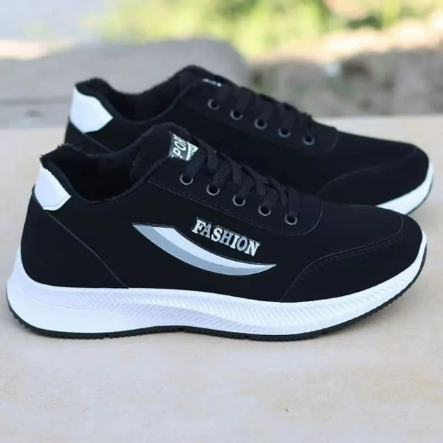 Black men's sneakers with white sole and silver side stripe