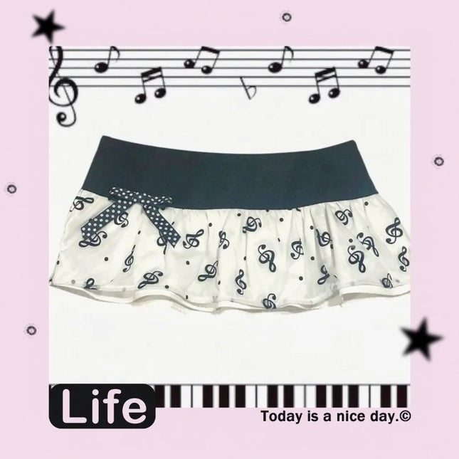 Y2K Musiknoten-Print Minirock, schwarz-weiß Rüschen-Mikrorock mit Tupfen-Schleife, Kawaii Ästhetik niedrige Taille Rock für Frauen