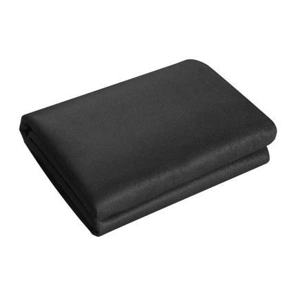 Neatly folded rectangular black fabric sheet on a white background